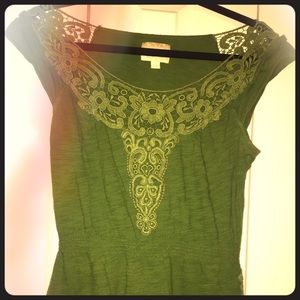 Green top with crochet details